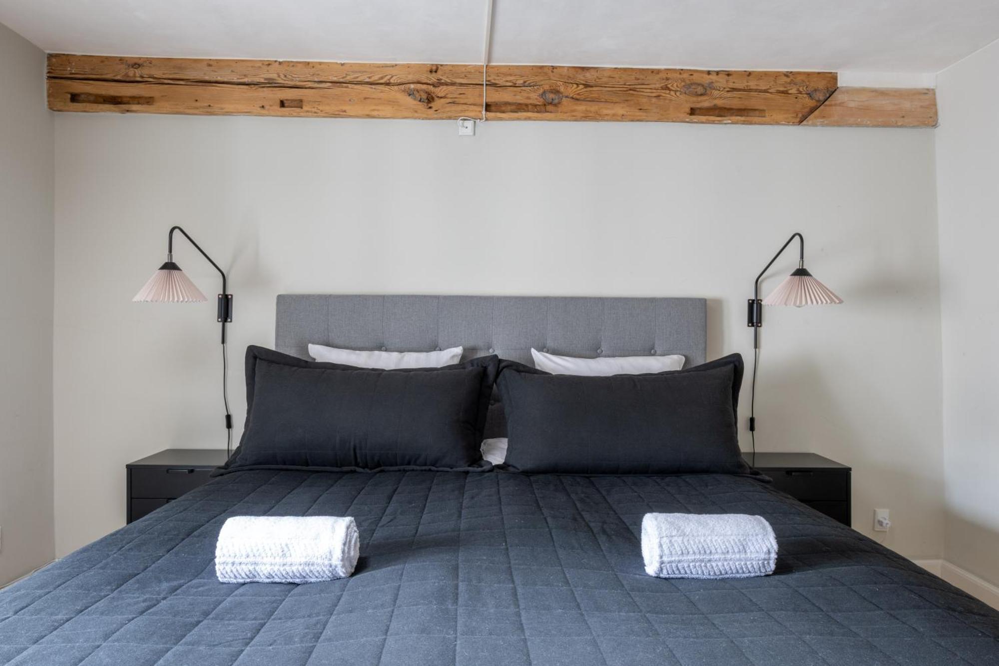 Apartment With Exposed Ceiling Beams *